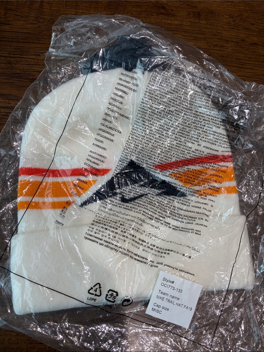 NEW Nike Trail winter hat with Pom Pom Cream with navy & orange